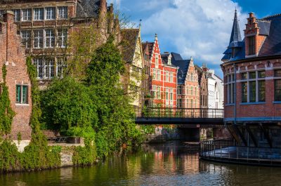 Travel Belgium medieval european city town background with canal. Ghent, Belgium