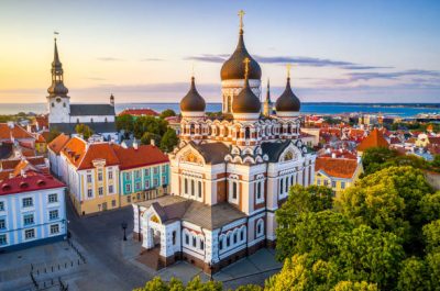 aerial view of Alexander Nevsky cathedral and St Mary's Cathedral at sunset in Tallinn, Estonia