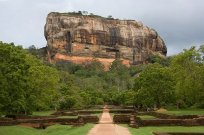 Lion Rock at Sigiriya (or Sinhagiri) in Sri Lanka - an ancient rock fortress nearly 200m (660ft) high. King Kasyapa built his palace on the top of this rock in about 485AD. On a small plateau about halfway up the side of the rock is a gateway in the form of an enormous lion. UNESCO listed World Heritage Site.