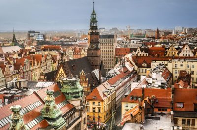 View from above on amazing architecture of Wroclaw city in Poland. Scenic old center part with colorful roofs and houses of Wroclaw.